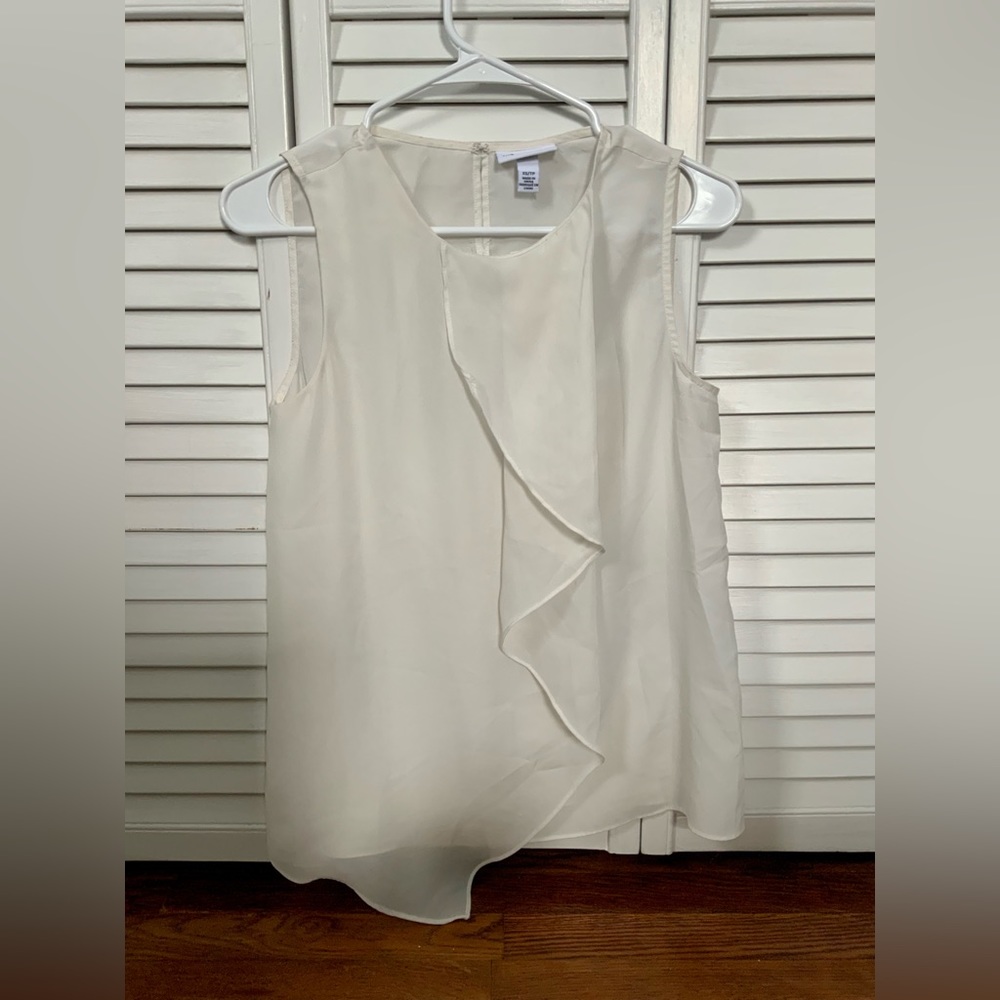 Cream colored asymmetrical blouse
